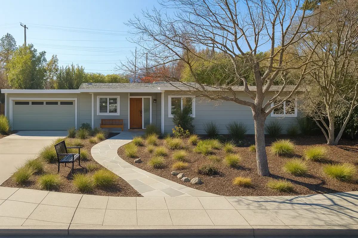 A single-storey Redwood City mid-century house with a long low roofline and a deep overhang across the front.